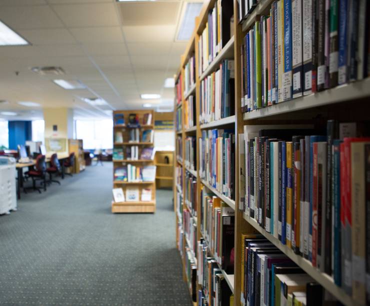 A view of the book stacks and computer areas in the library.