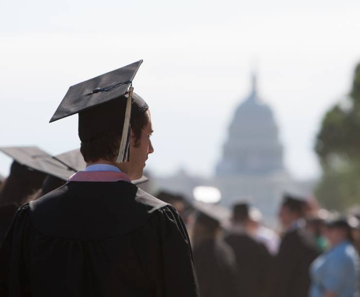 A student faces the Capitol.