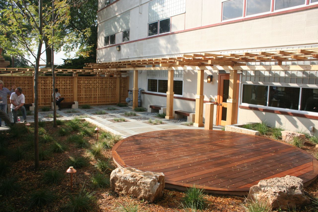 An image of the outdoor patio of the Faraday Center which includes a zen garden.