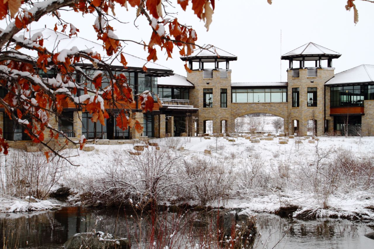 An image of the Agora Center towers covered in snow.