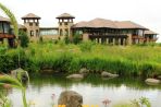 The prairie swale with the Agora towers in the background.