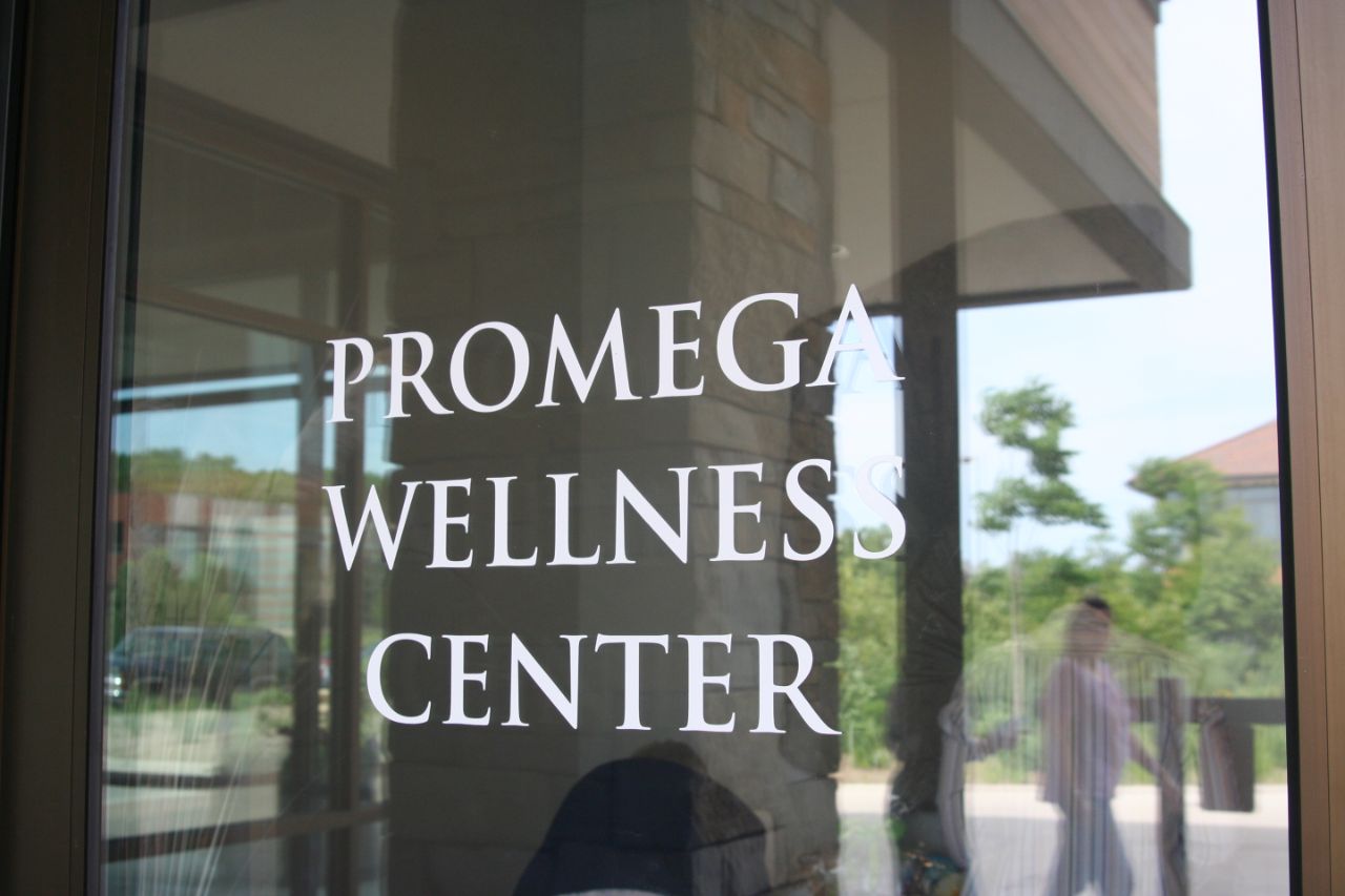 The Promega Wellness Center Sign on the entrance door.