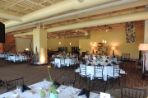 The Ideation Center set up for an event with tables full of linens.