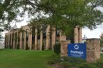 The Rosalind Franklin Center from the view of the driveway with the Promega sign out front.