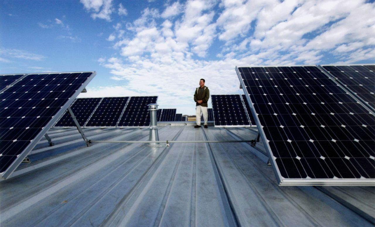 Pilot Scott amongt the solar panels.