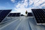 Pilot Scott amongt the solar panels.