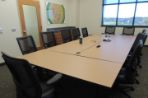 One of the da Vinci Center meeting rooms with a table and chairs.