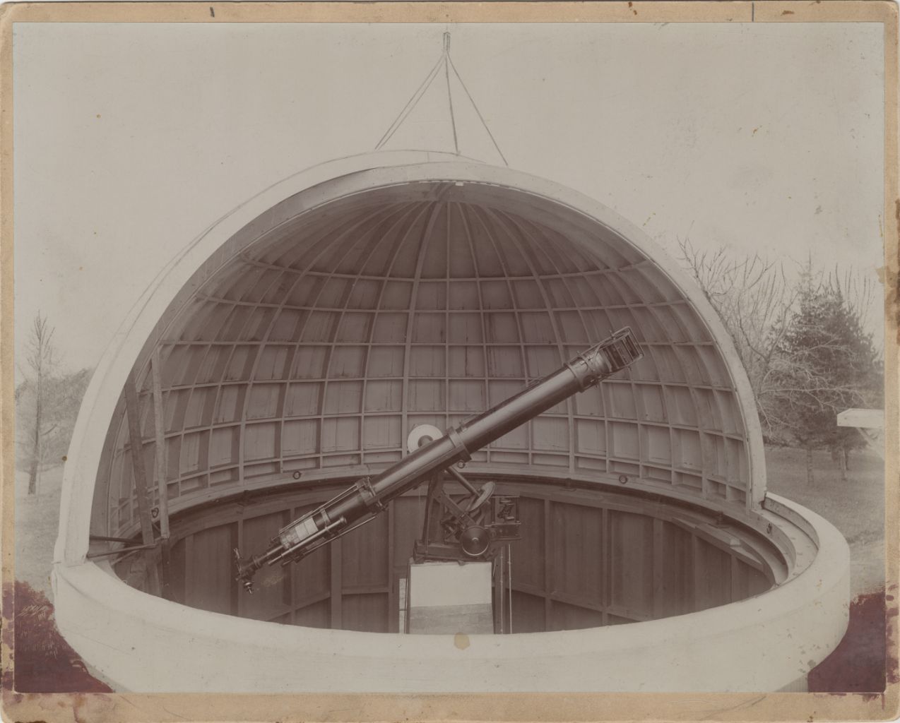 An image of the dome, half open, to show the large telescope inside.