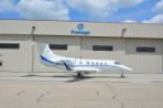 A photo of one of the corporate planes that's named The Phenom.