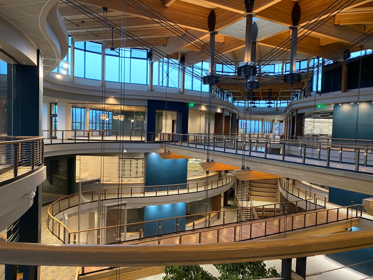 The Kornberg Center Atrium has suspended bridges that connect each section of the building three floors above the atrium floor.