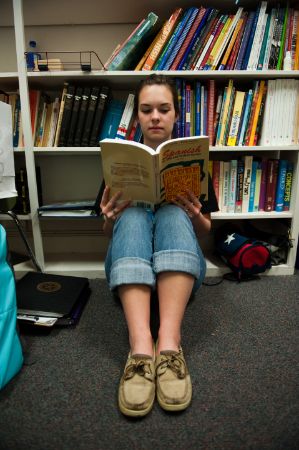 Reading on the library floor