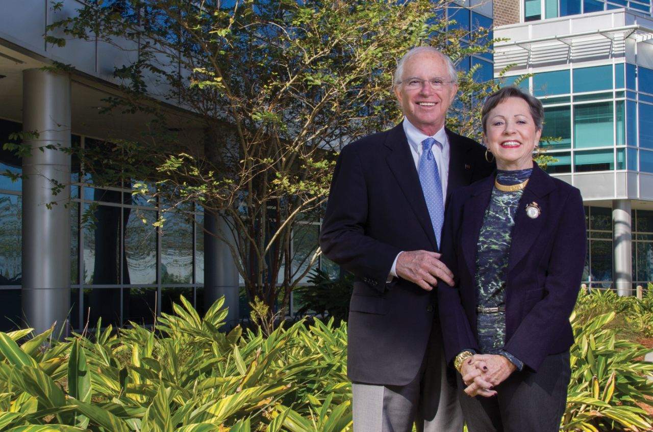 Tom and Betty Petway standing in front of Petway Hall.